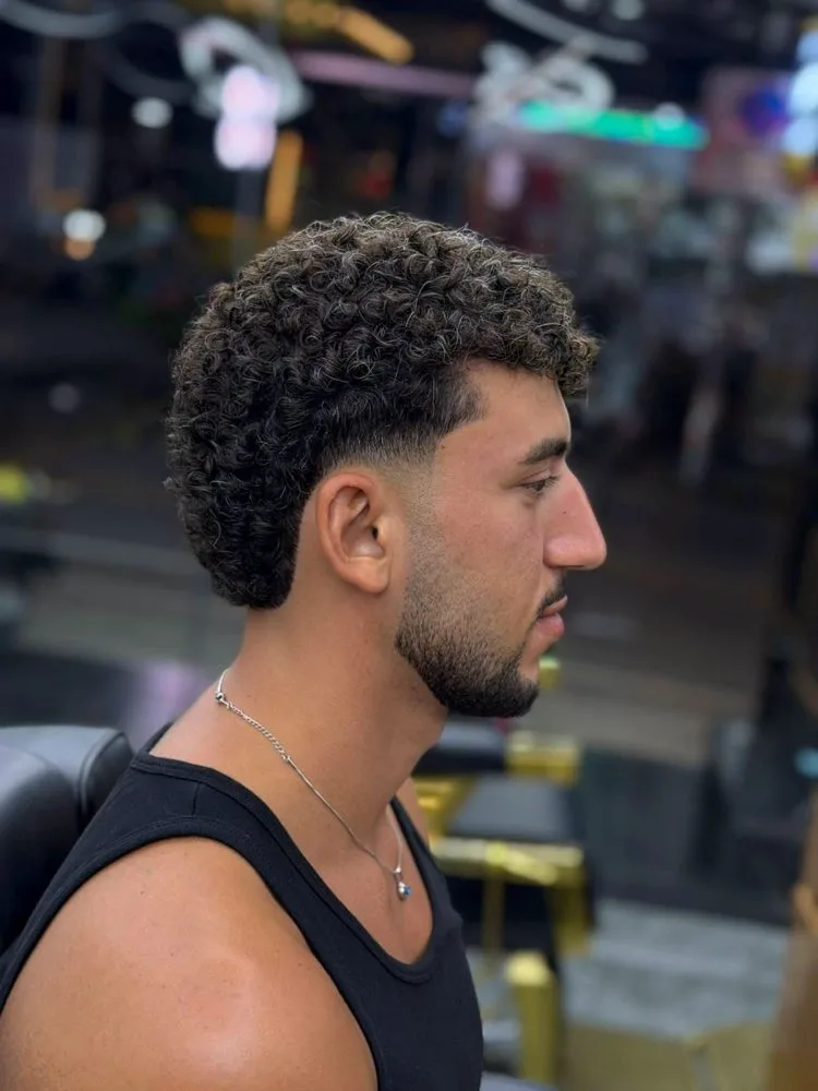 Curly crop with low fade