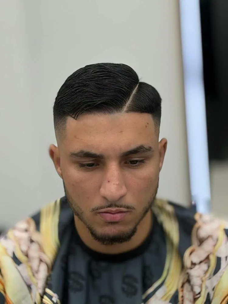 Comb over with skin fade